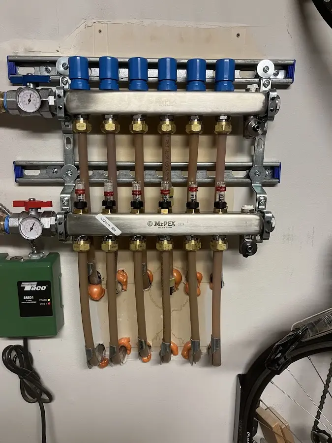 Plumber performing Water Heater Repair at a residential property in Fair Lawn